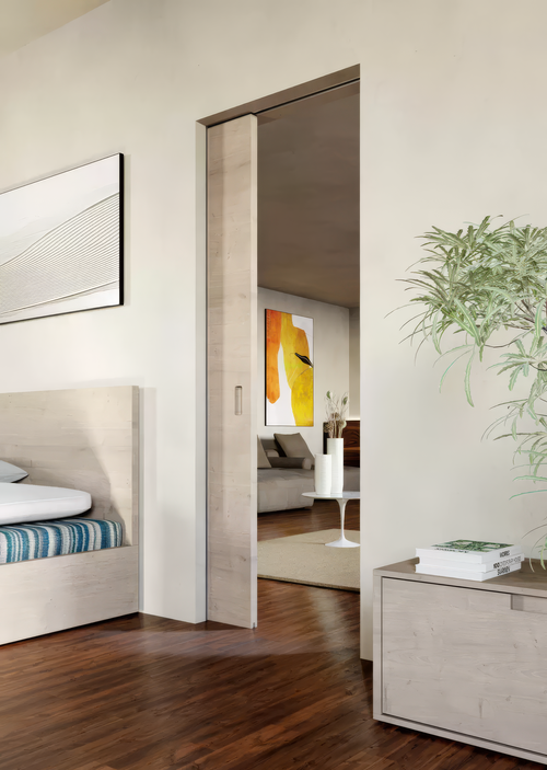 Modern bedroom with sliding door, bed, and decor elements.