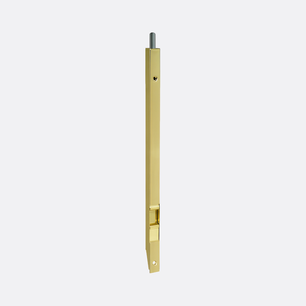 Gold door bolt against a white background