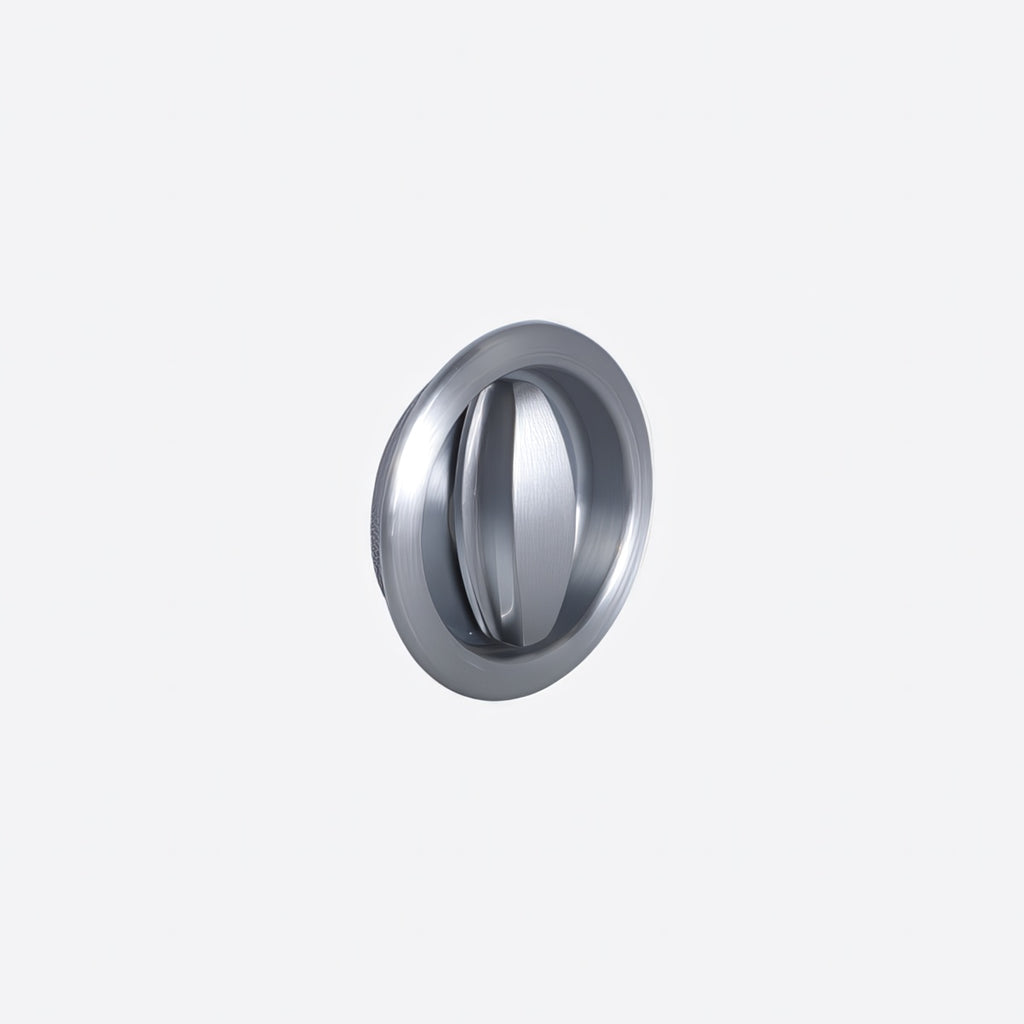 Metallic circular door handle on a light gray background