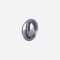 Metallic circular door handle on a light gray background
