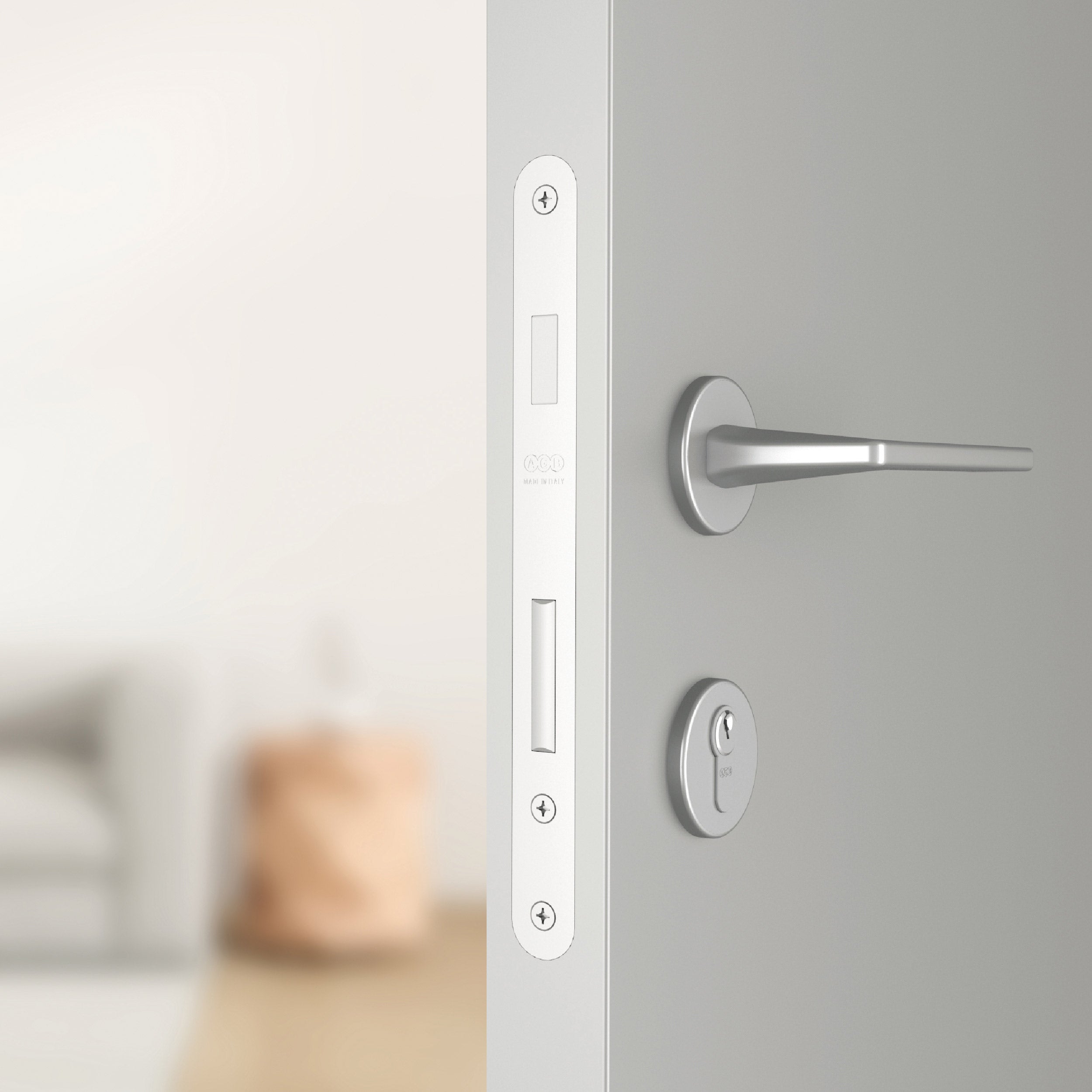 Close-up image of a white door with Sicurezza XT installed