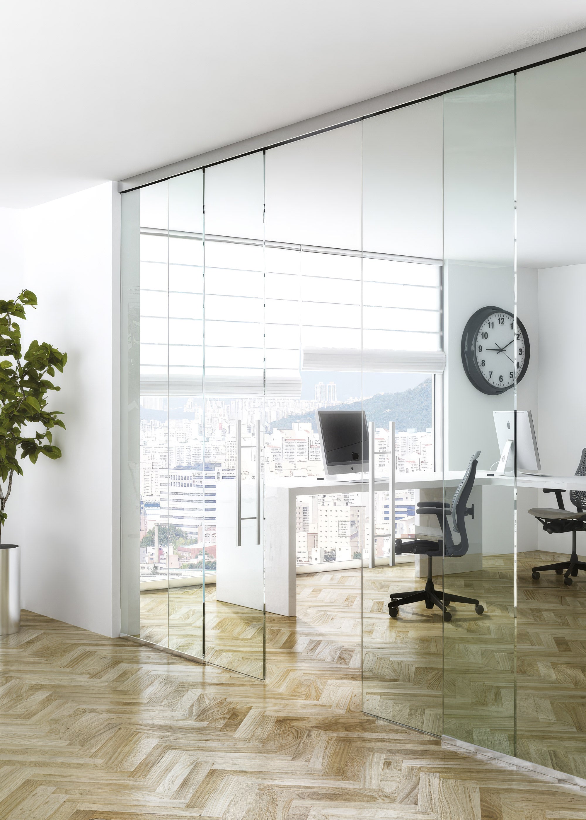 Modern office with glass walls, desk, and chair.