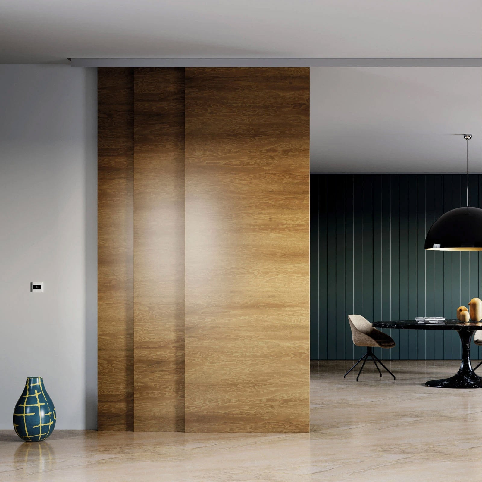 Modern interior with a sliding wooden panel, vase, and chair.