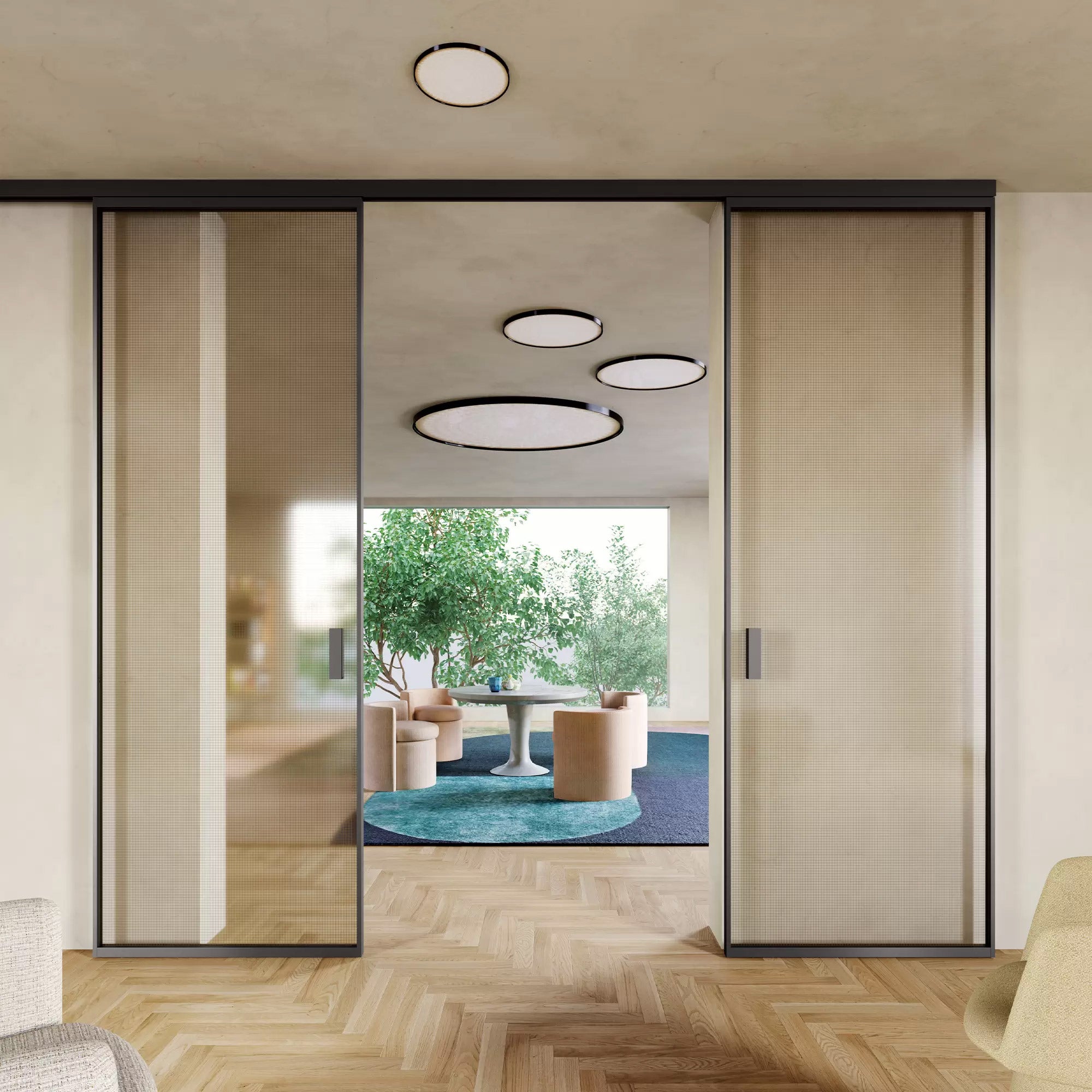 Modern interior with sliding glass doors leading to an outdoor patio.