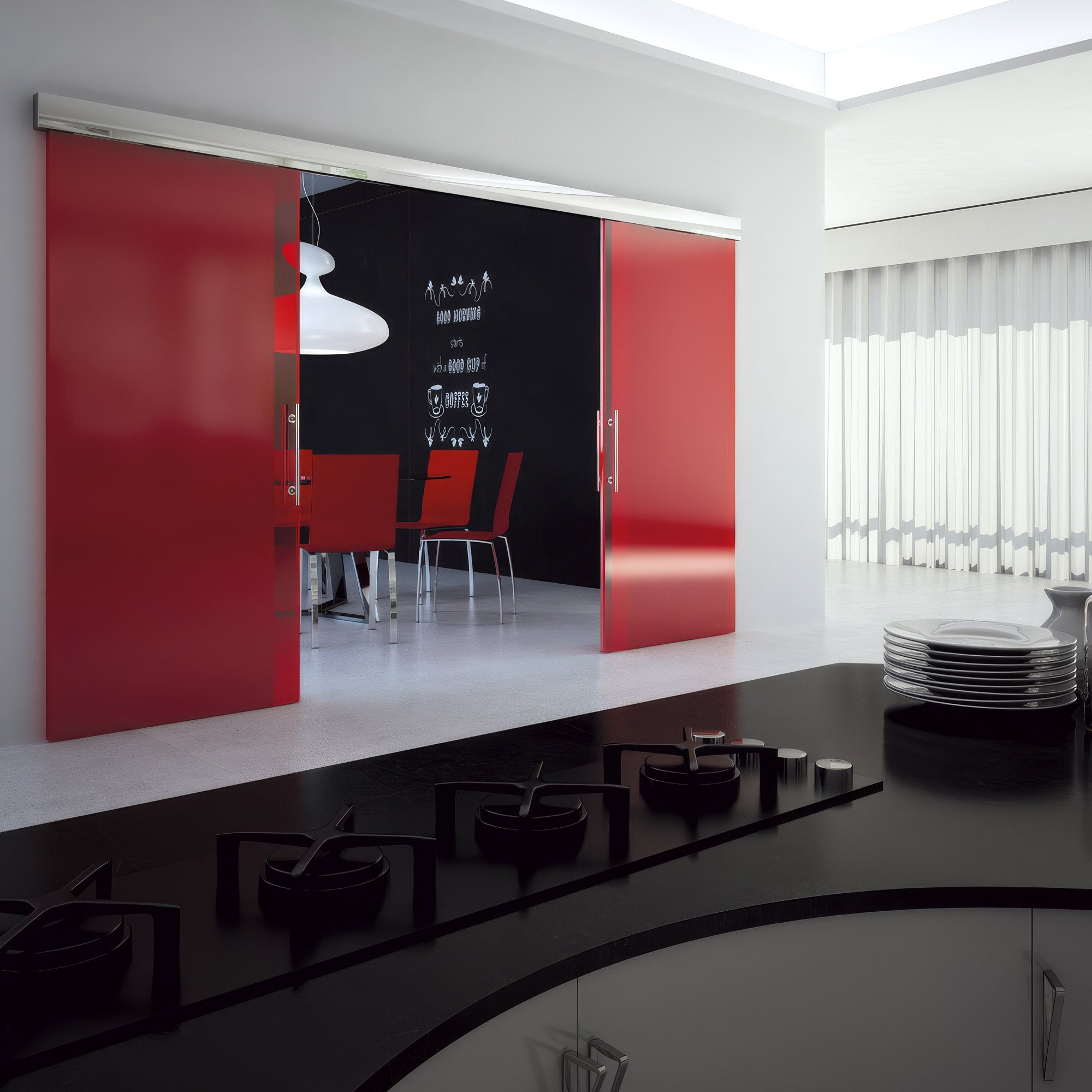 Modern interior with red sliding doors, black and white decor, and a dining area.