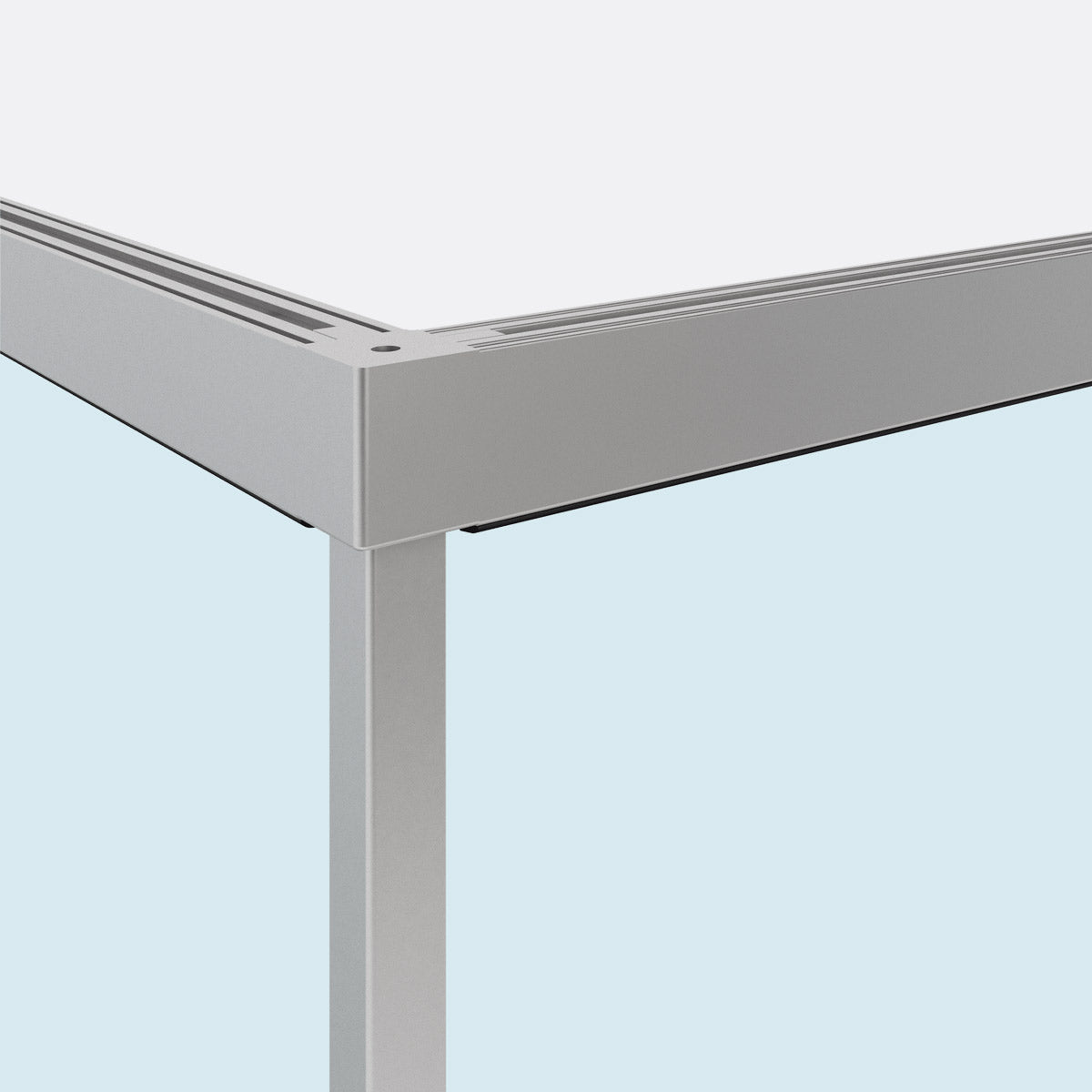 Corner detail of Vetro Fisso aluminum profile system supporting fixed glass panel wall.